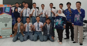 Tim Pengabdian  USM Gelar Pelatihan dan Lomba Game di SMKN 11 Semarang