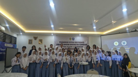 Lindungi Siswa dari Jerat Kontrak Palsu, Tim FH USM Beri Penyuluhan di SMKN 2 Semarang