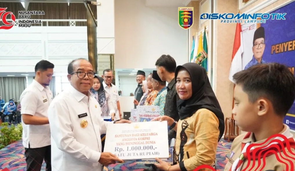 Penjabat Gubernur Lampung Serahkan Tali Asih dan Santunan bagi Anggota KORPRI yang Purna Bakti serta Keluarga Anggota yang Meninggal Dunia.